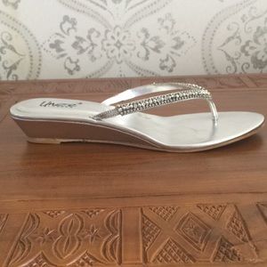 NWT. Silver wedge sandals with diamonte detailing